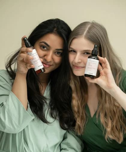 Two women smiling together